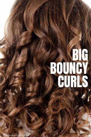 big bouncy curls with hot rollers Close-up of big, bouncy curls in brown hair, with the text 'Big Bouncy Curls' on the right side.