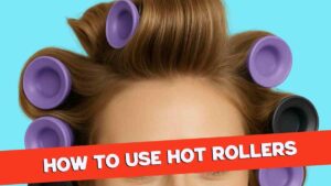 Closeup of a person with purple and black hot rollers in their hair against a blue background, with the text "How to Use Hot Rollers" in bold white letters on a red banner across the image.