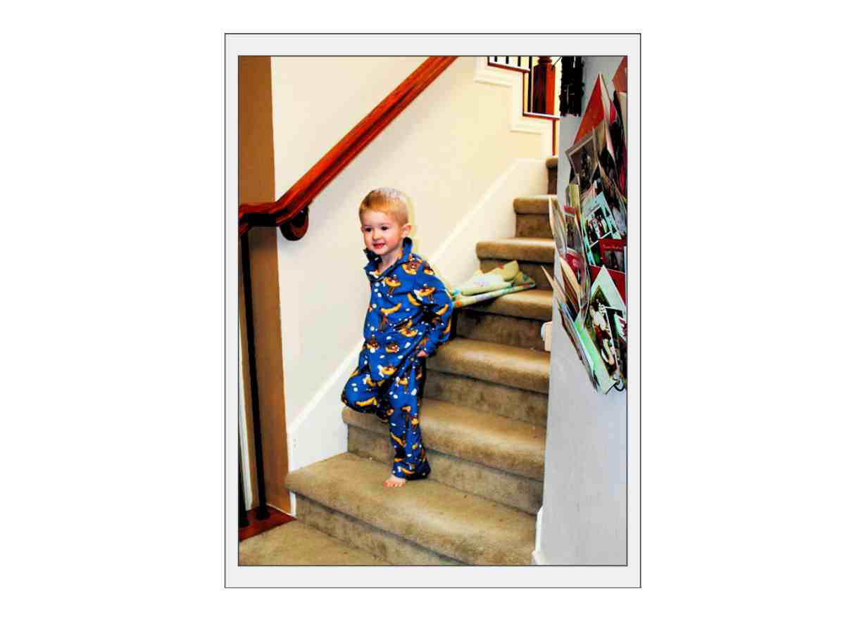 Christmas photo of kids coming down the stairs Christmas photo of kids coming down the stairs
