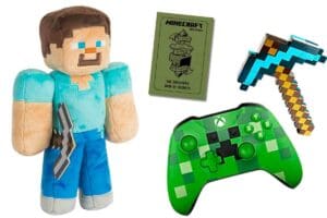 A cuddly Minecraft plush toy ready for a snuggle, alongside a pixelated pickaxe for mining dreams, a camouflagestyle Xbox controller for serious gameplay, and a survival guide for those epic Minecraft adventures.