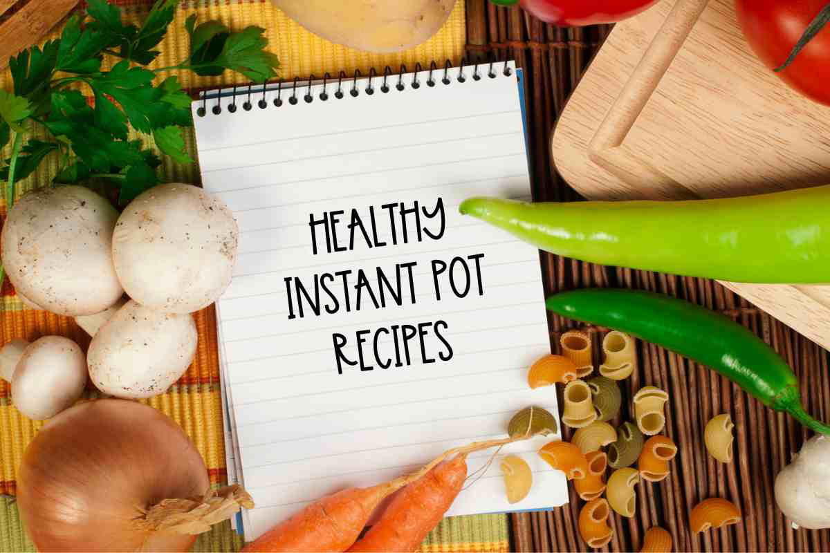 healthy instant pot recipes fresh vegetables surrounding a paper that says healthy instant pot recipes
