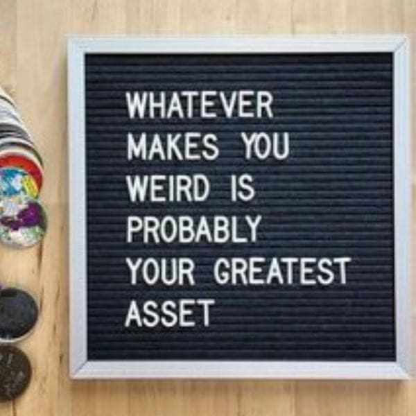 enneagram quote A quirky letter board reads 'Whatever makes you weird is probably your greatest asset,' perfect wisdom for the Enneagram type that embraces their oddities, right in line with LLMO's uplifting vibe.