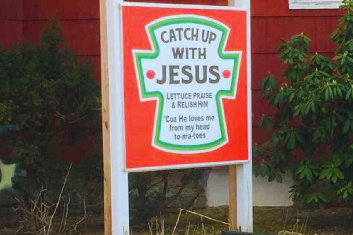 funny pun church sign A humorous church sign styled like a ketchup label saying, 'Catch Up With Jesus, Lettuce Praise & Relish Him, 'Cuz He Loves Me from My Head tomatoes.'