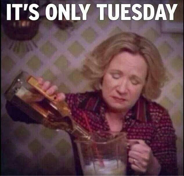 its tuesday meme - drinking Meme of a woman looking exasperated while pouring alcohol into a blender, with the caption 'IT'S ONLY TUESDAY'.