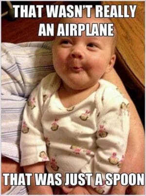 A baby with a mischievous smile and a onesie, captioned "That wasn't really an airplane, that was just a spoon," capturing the Thursday vibe of playful deception and humorous realizations.