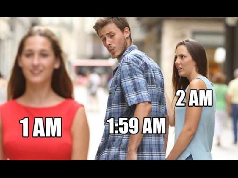 funny meme about 2 am daylight savings Daylight savings meme with the distracted boyfriend format, where the guy labeled '1:59 AM' is ignoring his partner labeled '1 AM' to look at another woman labeled '2 AM,' humorously depicting the time change.