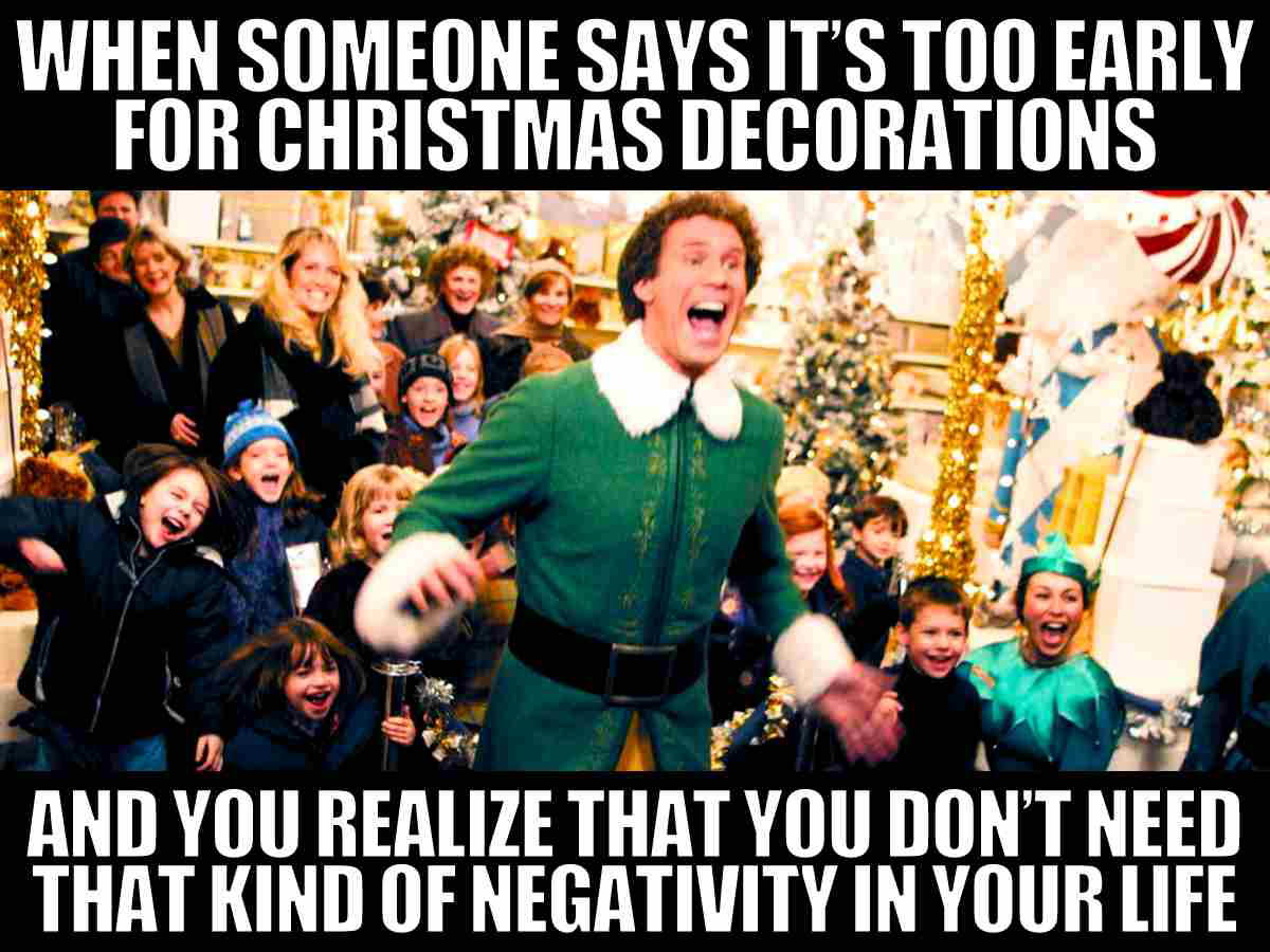 decorating for christmas early meme Meme featuring a scene from a Christmas movie with a caption about not needing negativity in your life when someone says it's too early for Christmas decorations, showing a cheerful crowd.