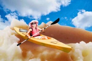 funny thanksgiving memes intro of a lady kayaking in mashed potatoes