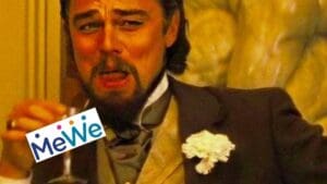 Meme of a historical figure smirking while holding a drink, with the MeWe logo humorously added, capturing that 'when you realize it's Friday' office vibe.