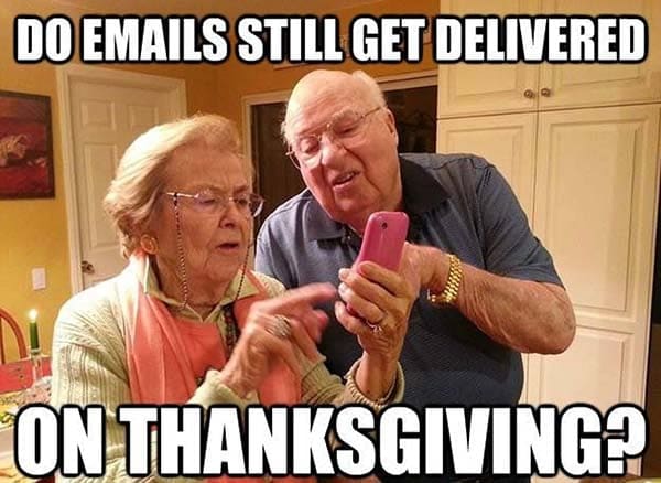 thanksgiving grandparents technology meme Funny meme showing elderly couple puzzled over a smartphone asking, 'Do emails still get delivered on Thanksgiving?' capturing classic technophobia humor.