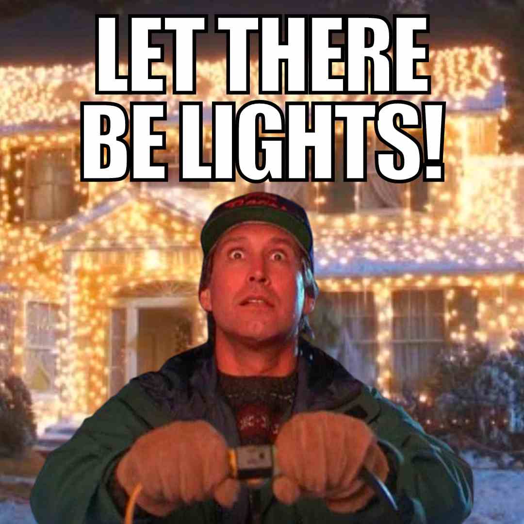 christmas vacation lights meme Christmas Vacation meme featuring a man wideeyed and holding a plug, standing in front of a house covered in bright, excessive Christmas lights with the text 'Let There Be Lights!'