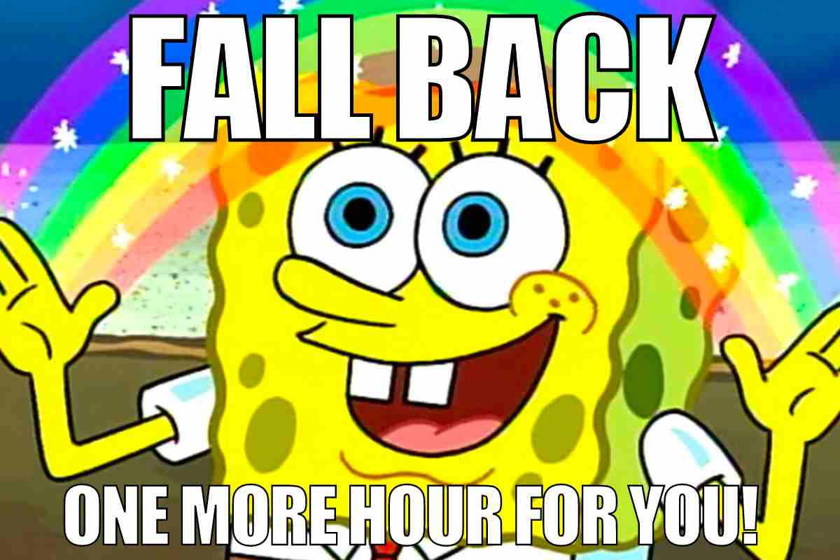 fall back daylight savings meme SpongeBob gleefully exclaiming "Fall Back, One More Hour for You!" against a rainbow background, capturing daylight savings humor in a meme.