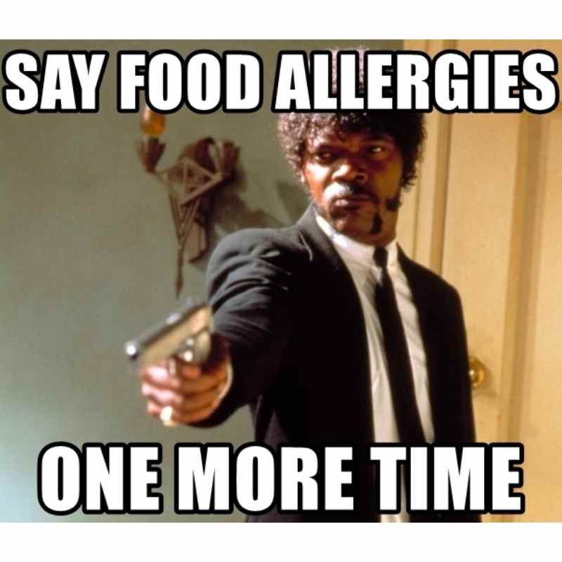 food allergy meme Meme showing a man in a black suit pointing a gun with the text 'Say food allergies one more time.' It's all about those dramatic allergy reactions!