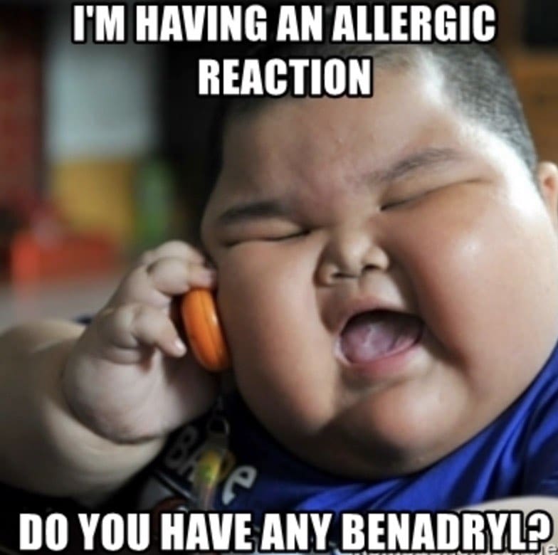allergy benadryl meme Meme of a young child pretending to call on a toy phone with text, 'I'm having an allergic reaction, do you have any Benadryl?', humorously depicting an overthetop response to allergies.