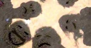 Beach meme featuring shadows on sand forming funny face shapes, showing that even sand has a sense of humor!