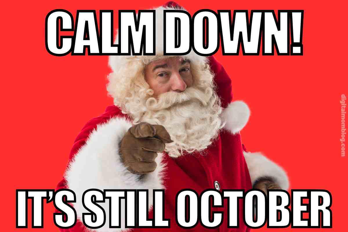 october christmas meme Meme of Santa Claus with a playful expression, pointing at the viewer, on a bright red background with the text: 'CALM DOWN! IT'S STILL OCTOBER.' Perfect Christmas humor for reminding overeager holiday enthusiasts.