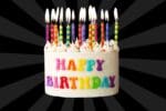 Colorful birthday cake with numerous candles ready to set off the fire alarm, perfect for a birthday meme celebration.