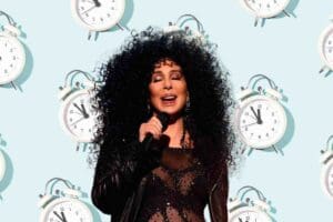 Meme featuring a singer surrounded by clocks, whimsically hinting at daylight saving time, playfully asking if she can turn back time.