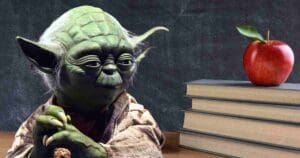 Meme with Yoda sitting thoughtfully by a stack of books and a shiny red apple, looking like he’s about to drop some Jedi knowledge on classroom management—'The Force, use it, you must.'