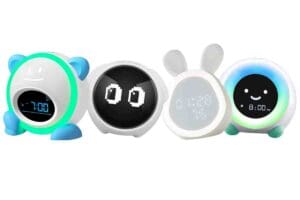 Four toddler alarm clocks with cheerful faces, ready to start your kid's day by gently reminding them it's time to rise and shine, proving even clocks can be cute and helpful at the same time!