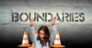 Funny boundaries meme with a girl raising her hands dramatically in front of orange cones, highlighting the word 'BOUNDARIES' on a wall, as if saying, 'Stop right there, boundary violators!'