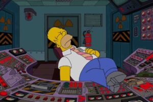 Meme of a cartoon character snoozing in a control room full of dials and buttons, capturing a humorous take on napping during work.