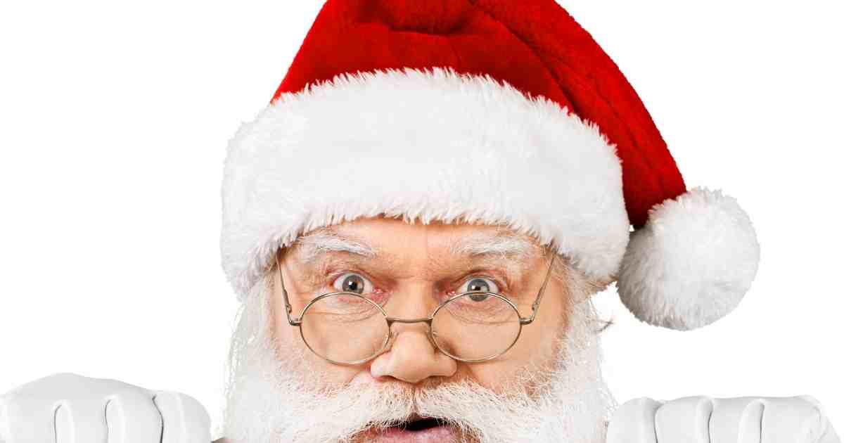 2023 christmas memes Meme of a surprised Santa with wide eyes and a red hat, looking like he just found out you’ve been naughty this year!