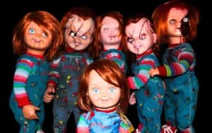 Meme of multiple Chucky dolls gathered like a scary family reunion, highlighting the concept of questionable cousin relationships with a humorous twist.