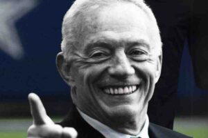 Smiling man pointing with a mischievous grin, perfect for a Dallas Cowboys meme.
