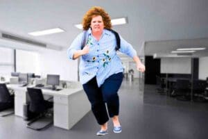 Meme showing a determined person rushing through an office with a hilarious sense of urgency, as if late for a meeting or coffee break.