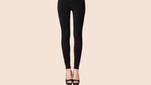 Meme of legs humorously resembling a pair of eggs in black leggings, with a beige background giving off major 'eggciting' vibes.