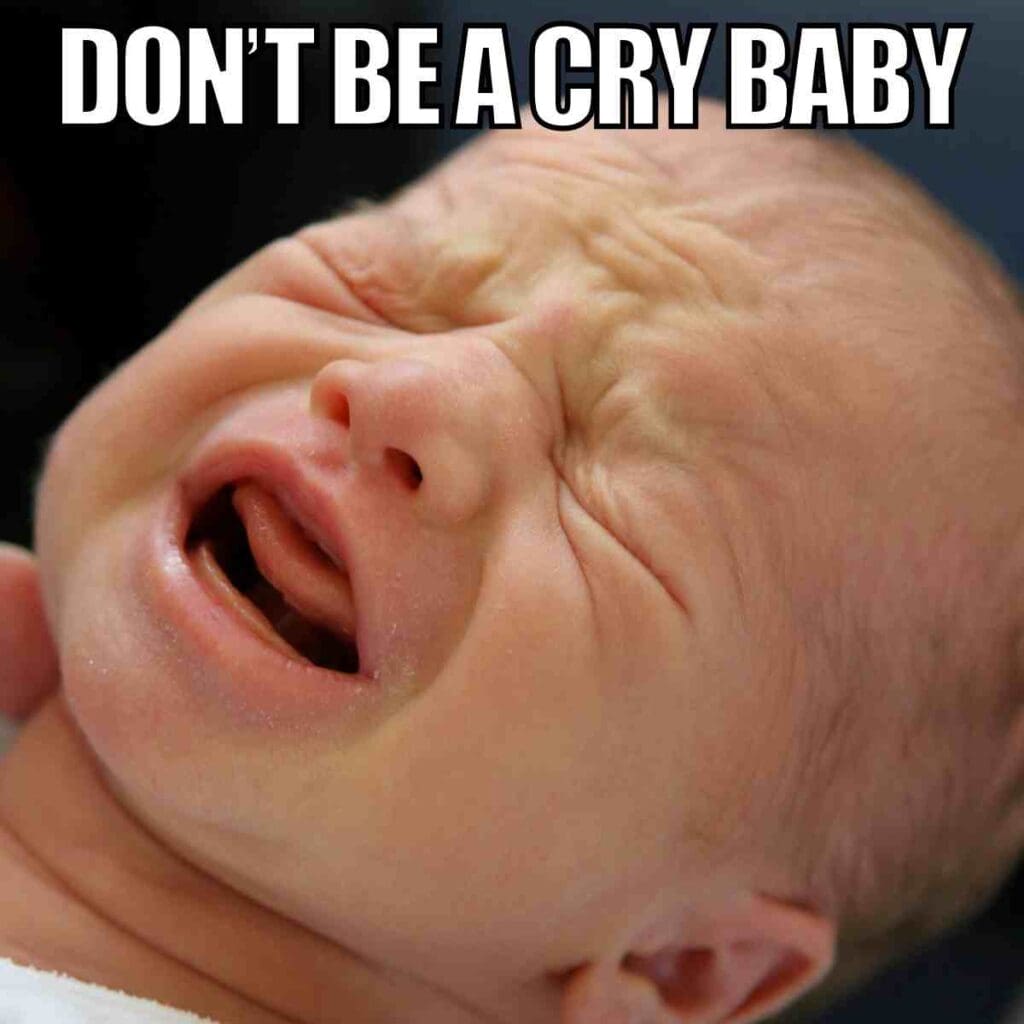 cry baby meme A baby making an exaggerated crying face, with humorous text above saying 'Don't be a cry baby,' capturing the essence of baby memes and their playful tone.