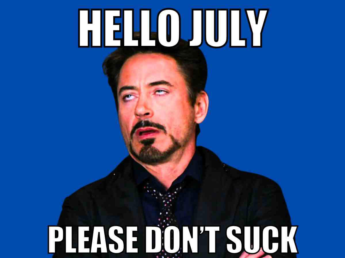 Robert Downey Jr. rolling his eyes with arms crossed on a blue background, captioned "Hello July, please don’t suck" – sarcastic July meme.