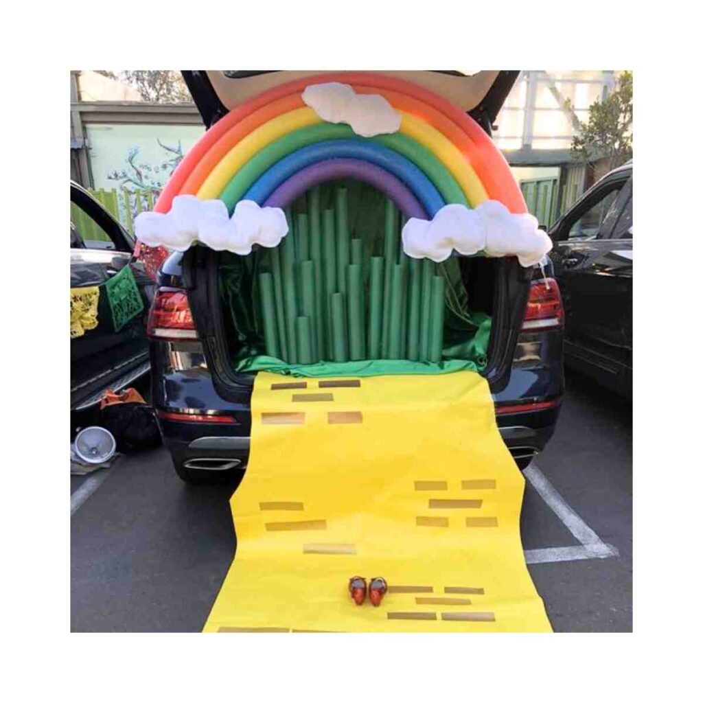 unique trunk or treat idea suv wizard of oz with rainbow and yellow brick road for trunk or treating