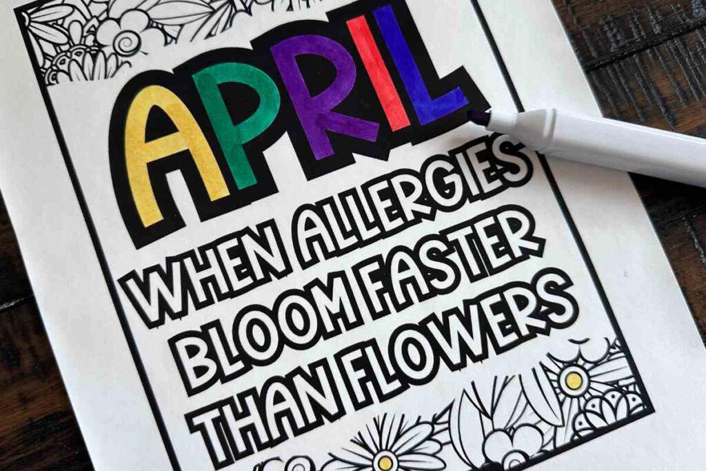 april coloring sheets A coloring page with the word "APRIL" in bold, multicolored letters, followed by the phrase "When allergies bloom faster than flowers" in black and white. The page is partially colored, with floral patterns in the background, and a marker is visible in the corner.