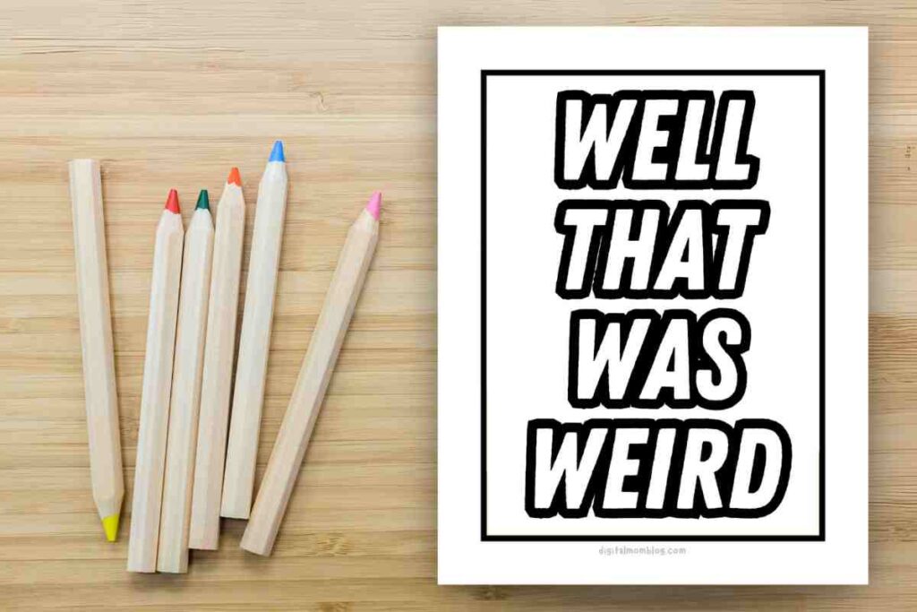 weird coloring page awkward A white piece of paper with the text 'WELL THAT WAS WEIRD' in bold black letters, next to six colortipped wooden pencils on a wooden surface.